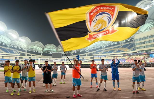 1698496794189047512.jpg kaiyun-青岛西海岸上演草根逆袭奇迹 从成立到中超仅7年